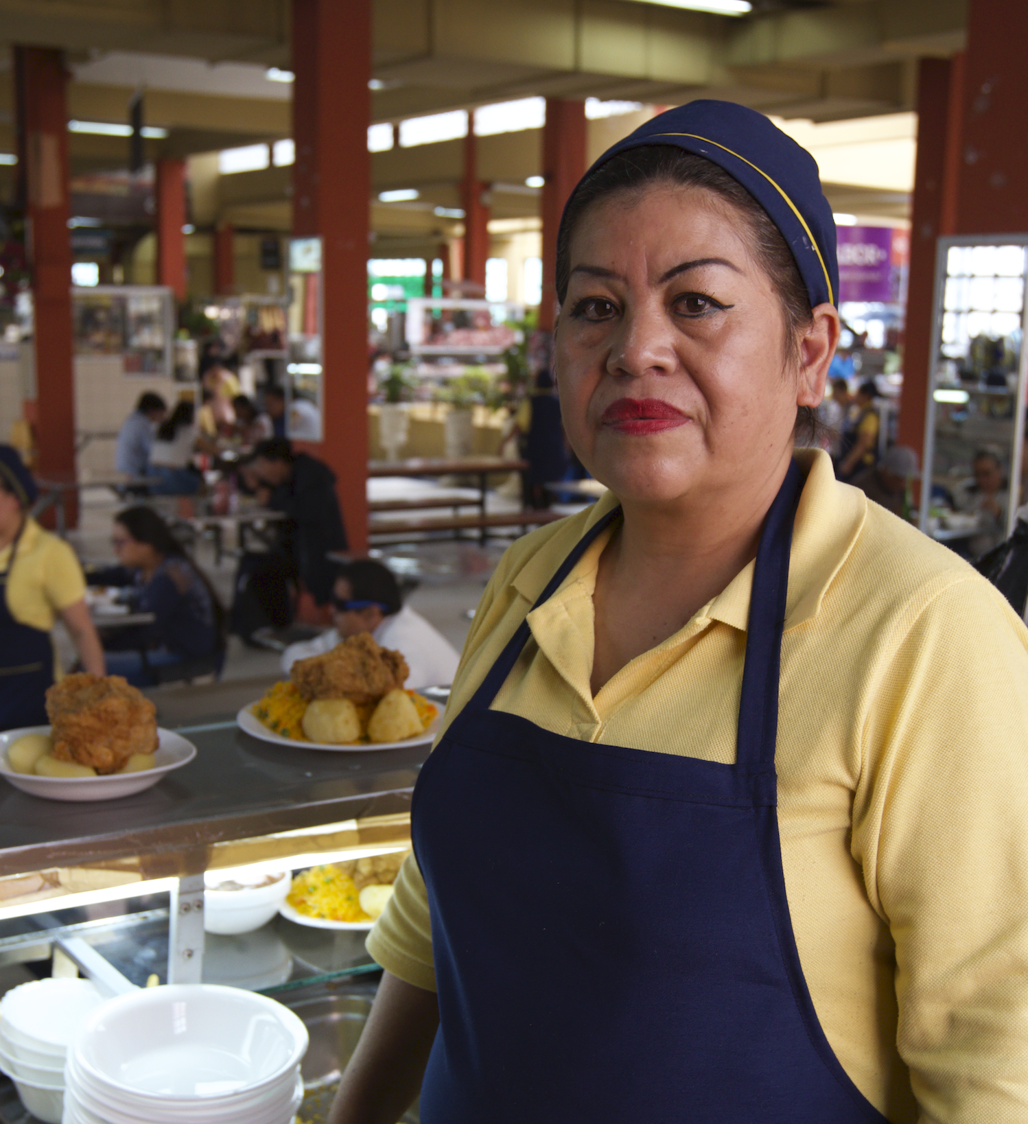 Woman standing at food stall