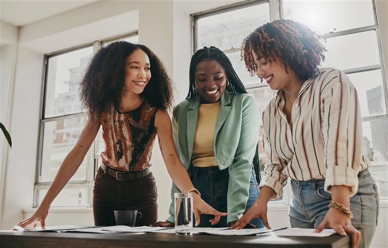 3 women working together