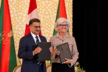 Picture of Lori Kerr and Sultan Allana at the MOU Signing Ceremony