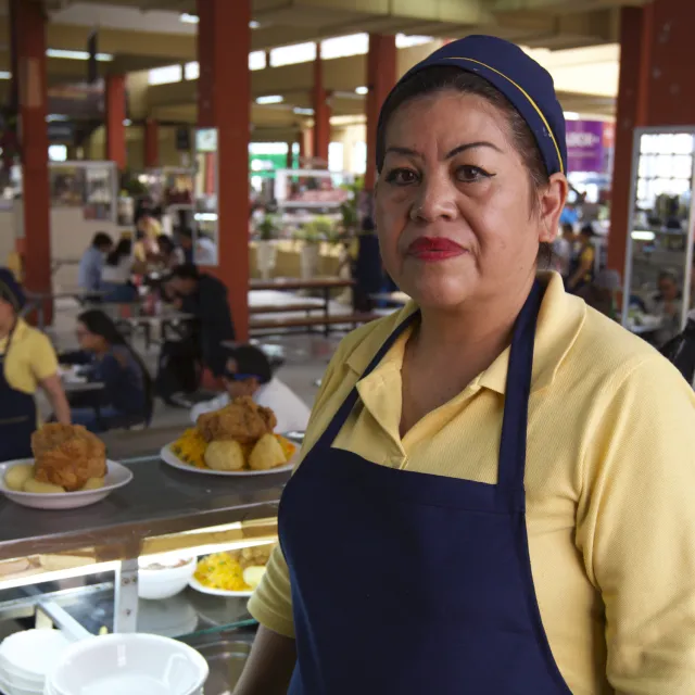 Woman standing at food stall