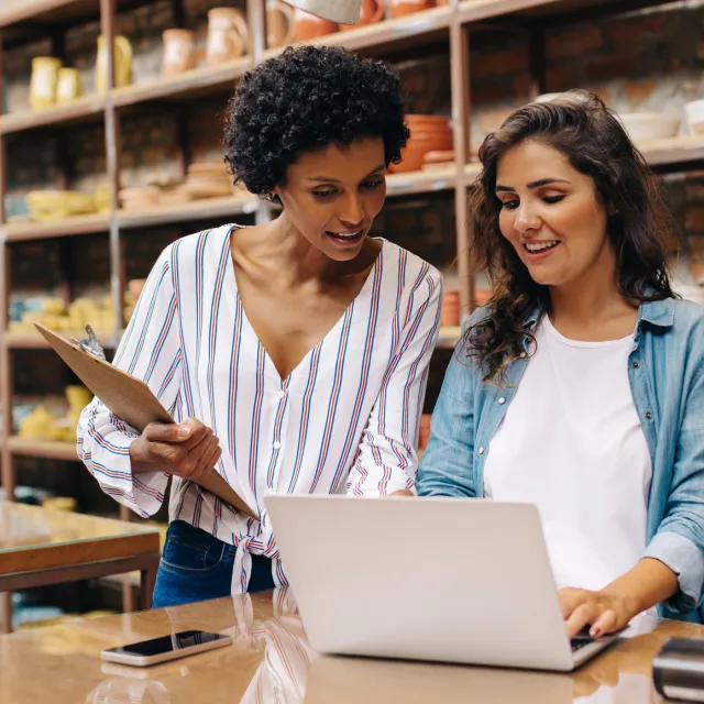 women looking at laptop