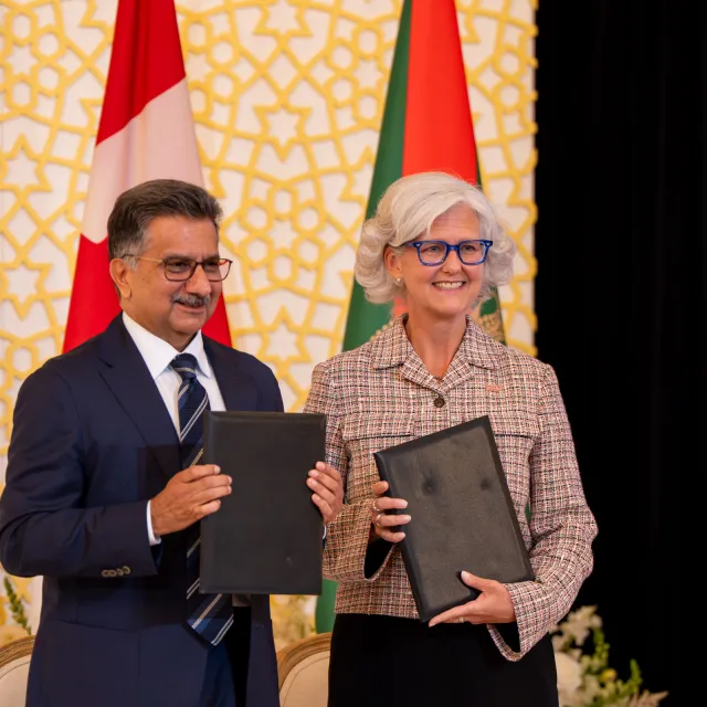 Picture of Lori Kerr and Sultan Allana at the MOU Signing Ceremony