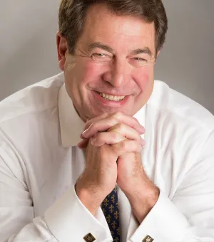 Image of man with brown hair smiling