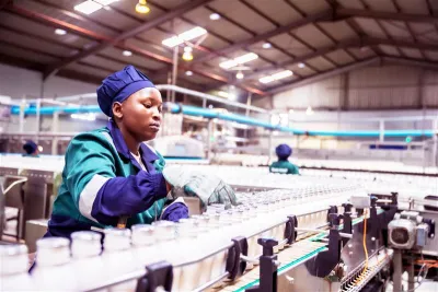 Female worker in a food-processing factory