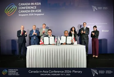 Group picture of the signing ceremony between FinDev Canada and IIF