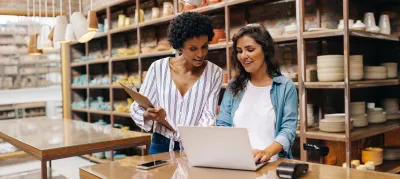 women looking at laptop
